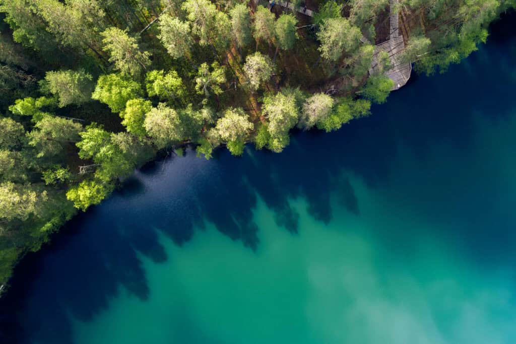 Aerial shot of a lake in Lagale - camping in Latvia 