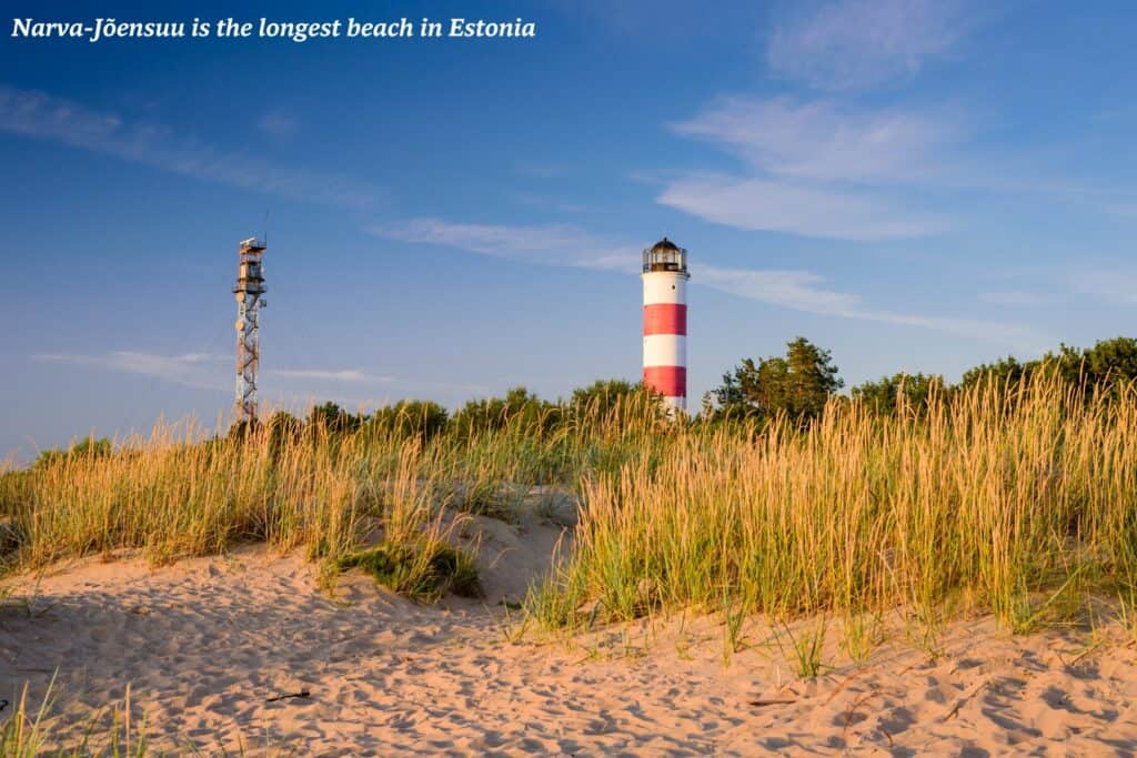 Lighthouse on the sand at narva-jõensuu beach  - best beaches in Estonia 