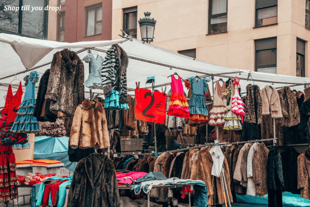 Clothes for sale at a flea market in Madrid -  reasons to visit Madrid 